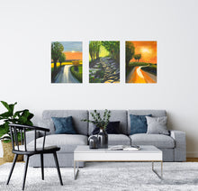 Load image into Gallery viewer, Room mock-up of a cream wall showing the painting on the paler wall over a grey sofa living room set up.  Sun low in sky lighting the road ahead and the trees almost in silhouette.  Emerging out into the evening light and enjoying nature walks.  Bathe in the light of the three tree lined sunlit paintings.