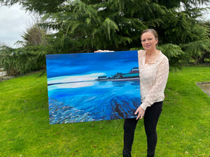1000x750 canvas print being held by Leonora to show the size reference.