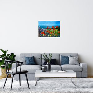 painting unframed in a room setting with a pale blue grey sofa and white walls