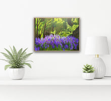 Load image into Gallery viewer, Image of painting in a frame on wall with a white shelf and potted plants. White 