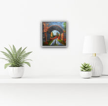 Load image into Gallery viewer, Image of white framed painting on a white wall above a shelf with potted plants 
