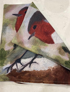 Soft feel fabric cushion cover. Image printed on both sides. Robin resting on a log. 