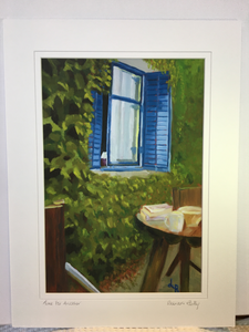 Picture shows a blue shuttered window opened up set in an ivy covered house   small round table sits with books and a coffee cup on it and two chairs waiting for you to sit down