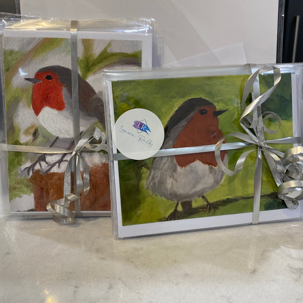 two packs of Robin cards, tied together with silver ribbon and a bow